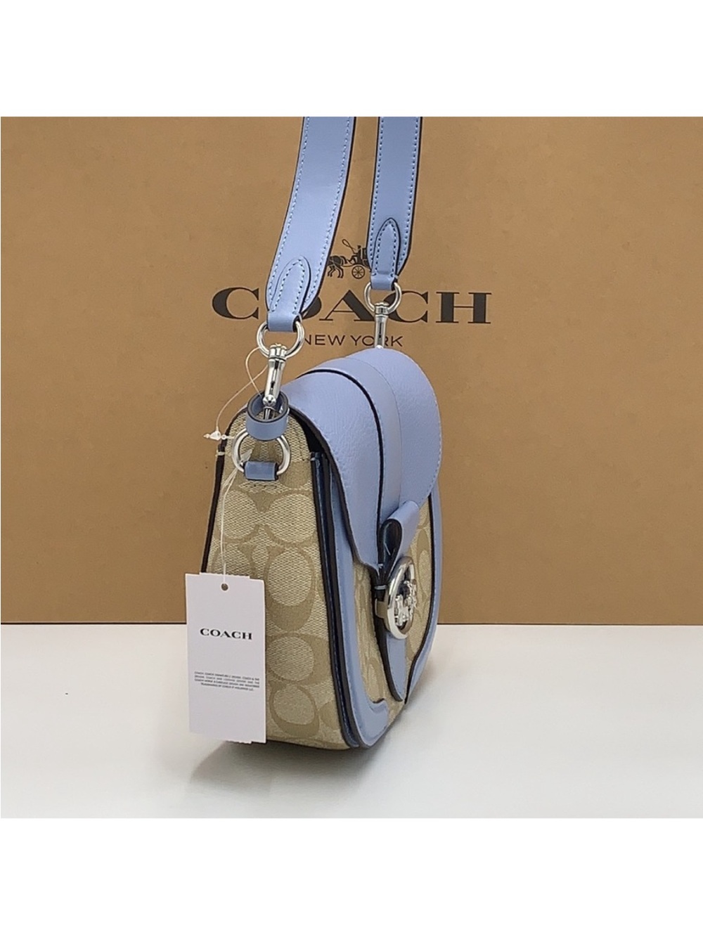 COACH Georgie Saddle Bag In Signat Canvas COLOR:
Silver/Light Khaki/Marble
Blue - Picture 8 of 16
